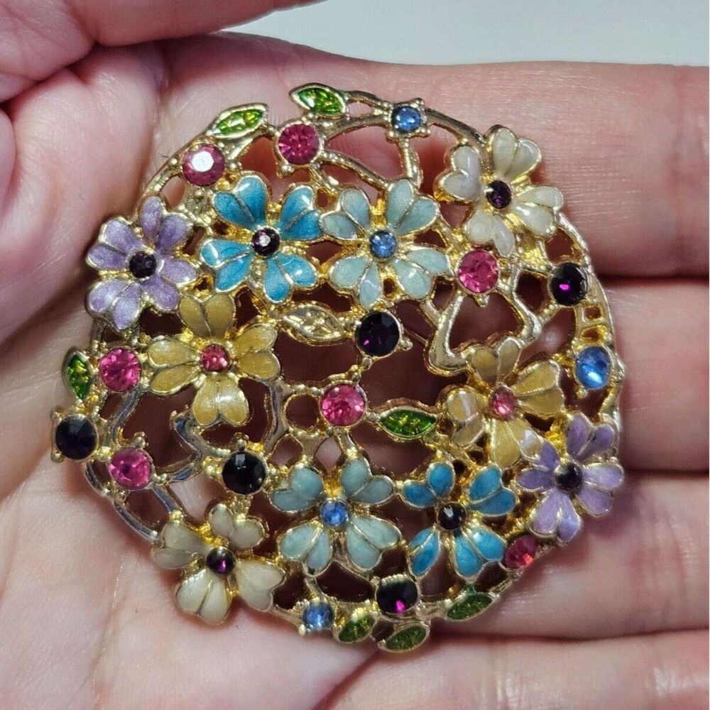Gold tone circular flower brooch colorful